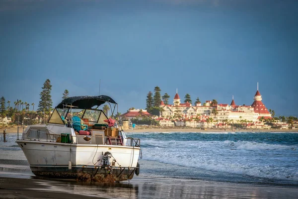 A boat that washed up on the beach at Coronado, CA, not exactly a deserted island.