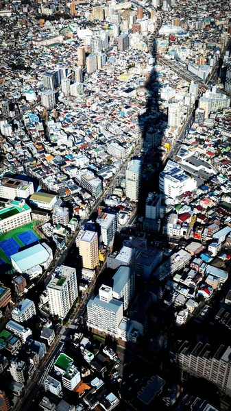 The shadow of the SkyTree is cast over the city of Tokyo Japan.