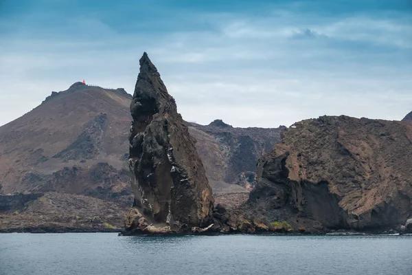 Pinnacle rock among extraordinary lava rock formations on Santiago Island, Galapagos Islands, Ecuador