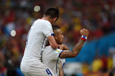 Rio de Janeiro, 18 Haziran 2014. Futbolcu Arturo Vidal, İspanya ile Şili arasındaki 2014 Dünya Kupası maçında Brezilya 'nın Rio de Janeiro şehrinde bulunan Maracan Stadyumu' nda mücadele etti.