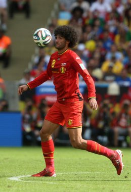 Rio de Janeiro, 18 Haziran 2014. Futbolcu Fellaini, Rusya - Belçika maçı sırasında Brezilya 'nın Rio de Janeiro şehrindeki Maracana Stadyumu' nda oynanan 2014 Dünya Kupası karşılaşmasında