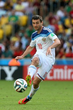 Rio de Janeiro, 18 Haziran 2014. Futbolcu Alan Dzagoev Rusya 'ya karşı oynanan maçta. Brezilya 'nın Rio de Janeiro kentindeki Maracan Stadyumu' nda düzenlenen 2014 Dünya Kupası için Belçika