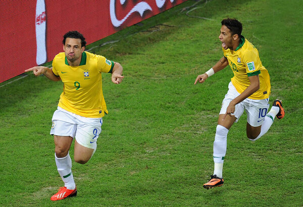 Rio de Janeiro, July 1, 2013.The soccer players of the Brazilian team, Fred and Neymar, celebrating the goal during the game Brazil vs. Spain in the final of the Confederations Cup 2013, at Maracana stadium.