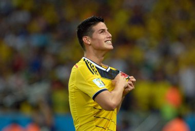Rio de Janeiro, 28 Haziran 2014. Futbolcu James Rodrigues, Brezilya 'nın Rio de Janeiro kentindeki Maracana Stadyumu' nda oynanan 2014 Dünya Kupası maçında Kolombiya ve Uruguay maçlarında attığı golü kutluyor..