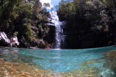 Cavalcante, October 21, 2017.Waterfall Santa Barbara, located in the community of Kalunga, within the Chapada dos Veadeiros, Cavalcante, Goias, Brazil clipart