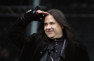 Rio de Janeiro, Brazil, September 22, 2013.Vocalist Andre Matos of the band Viper, during a show on the Sunset stage of Rock in Rio in the city of Rio de Janeiro. clipart