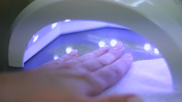 Woman Drying Nails Ultraviolet Light Home Conditions Lamp Gel Polish — Stock Video