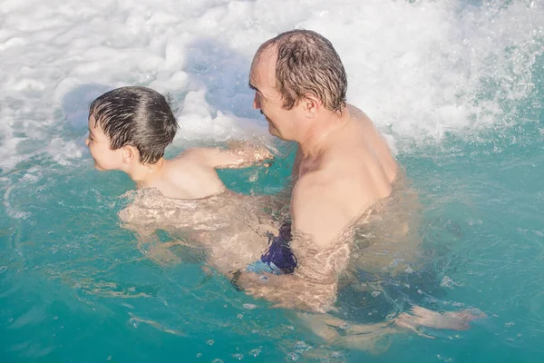 Happy Grandfather Grandson Spend Time Swimming Thermal Pool Grandpa Teaches — Stock Photo, Image