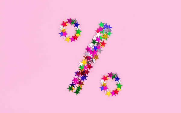 Rabattsymbol Symbol Aus Mehrfarbigen Sternen Auf Rosa Hintergrund Ein Prozentzeichen — Stockfoto