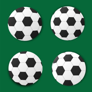 Dört futbol topu. Yeşil arka planda vektör topları. Bir topun düz çizimi. Stok Fotoğrafı.