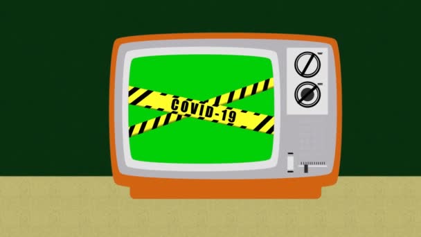 Covid 19警告黑黄相间的丝带在孤立的绿色背景上 在画一个老式复古电视机的平面设计时 科罗纳维勒斯危险区 警戒线到生命安全 — 图库视频影像