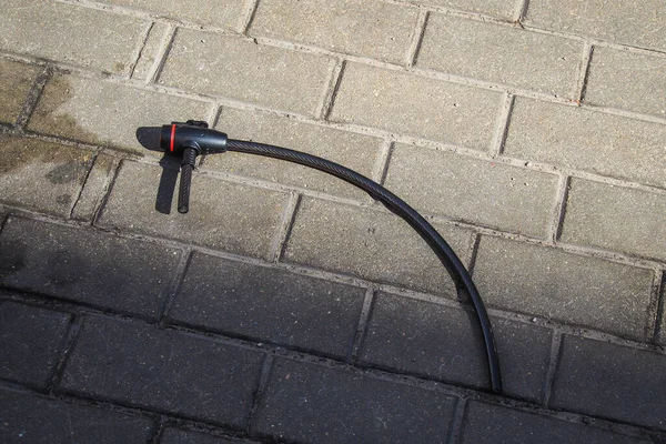 Bicycle theft. Folded bicycle lock. Stolen bicycle