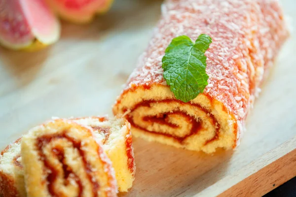 Swiss roll, Roll cake, typical Brazilian dessert, from the northeast region. Sliced cake roll with guava paste.