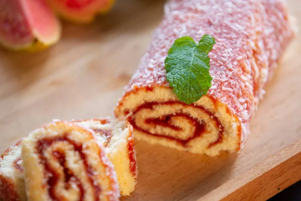 Swiss roll, Roll cake, typical Brazilian dessert, from the northeast region. Sliced cake roll with guava paste.