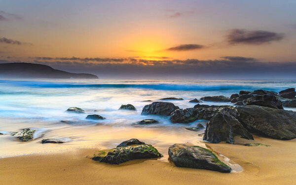 Shimming Soft Sunrise Seascape with Rocks from Killcare Beach on the Central Coast, NSW, Australia
.