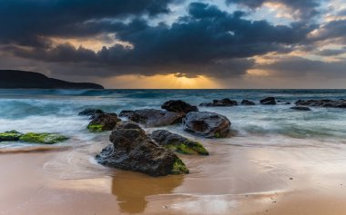 Rocky Sunrise at the Seaside from Killcare Beach on the Central Coast, NSW, Australia.