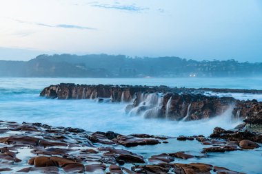 Sunrise Seascape from the North Avoca Beach rock platofrm on the Central Coast, NSW, Australia. clipart