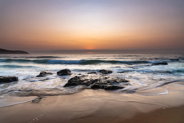 stock image Soft and hazy summer sunrise from Killcare Beach on the Central Coast, NSW, Australia.