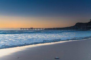 Sunrise Seascape with Sea Foam Central Coast, NSW, Avustralya 'daki Catherine Hill Bay Beach' te.