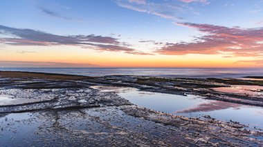 Central Coast, NSW, Avustralya 'daki Terrigal' da The Skillion 'dan güneşin doğuşunu yakalıyorum..