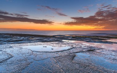 Central Coast, NSW, Avustralya 'daki Terrigal' da The Skillion 'dan güneşin doğuşunu yakalıyorum..
