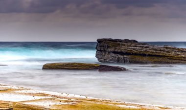 Central Coast, NSW, Avustralya 'daki Terrigal' da The Skillion 'dan güneşin doğuşunu yakalıyorum..