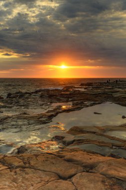 Capturing the sunrise from Avoca Beach on the Central Coast, NSW, Australia. clipart