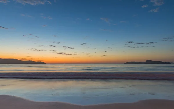 Watching the sun come up at Umina Beach, Central Coast, NSW, Australia.