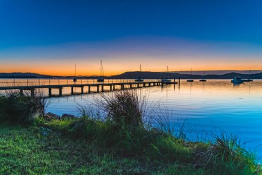 Gündoğumunu Koolewong rıhtımındaki Couche Park 'tan çekiyoruz..