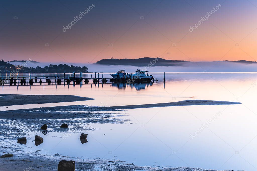 Misty Morning Sunrise Waterscape from Koolewong Waterfront on the Central Coast, NSW, Australia.
