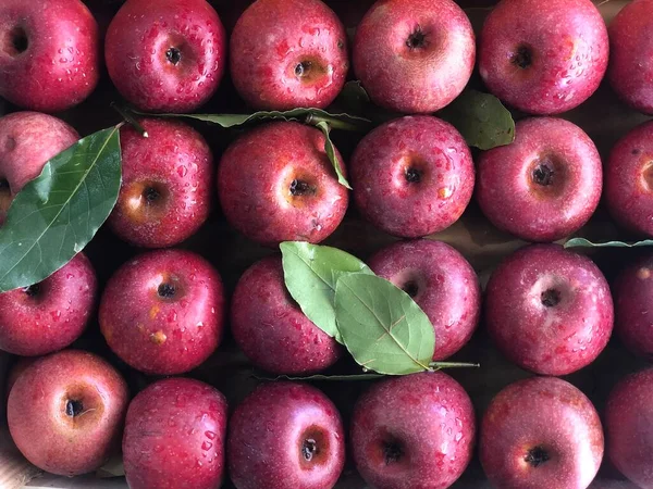 fresh apple fruit pile in a fruit shop