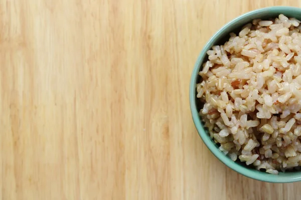 Brown Rice Wooden Table — Stock Photo, Image