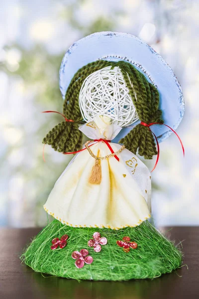 Spring handmade doll on background with bokeh — Stock Photo, Image