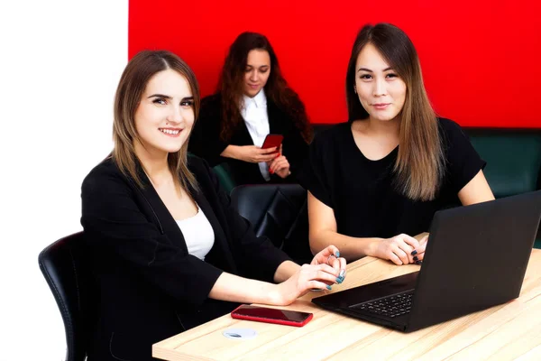 Team of estate agents in office close-up.