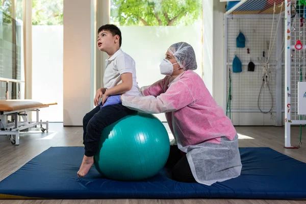 Disabled Child Top Large Green Ball Doing Physical Therapy Rehabilitation — Stock Photo, Image