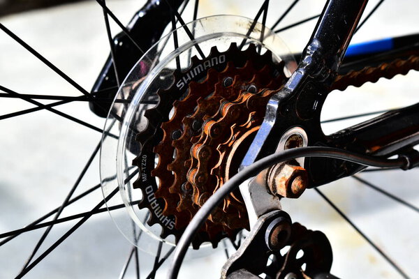 Auckland / New Zealand - June 12 2020: Close up view of mechanical part of bike parked on concrete driveway