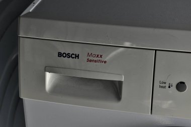 Auckland / New Zealand - June 12 2020: View of detergent drawer of Bosch washing machine clipart