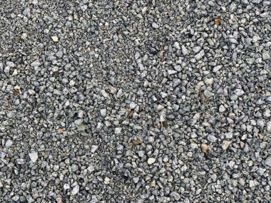 Scree Yüzey Dekorasyonu Üst Görünüm Arkaplanı. Kaldırımdaki çakıl taşlarının detayları. Gri Beton Taş Yapı Malzemeleri. Doğal Kaya Şablonu Kapanışı. Çakıl taşı zemin grunge Islak açık hava