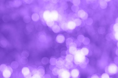 Soyut menekşe rengi bulanık bokeh arkaplan.