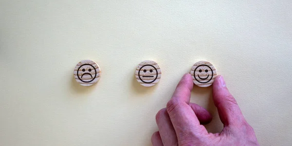 Various Emoticons Made Wooden Circles Hand Holding One Circles Yellow — 스톡 사진