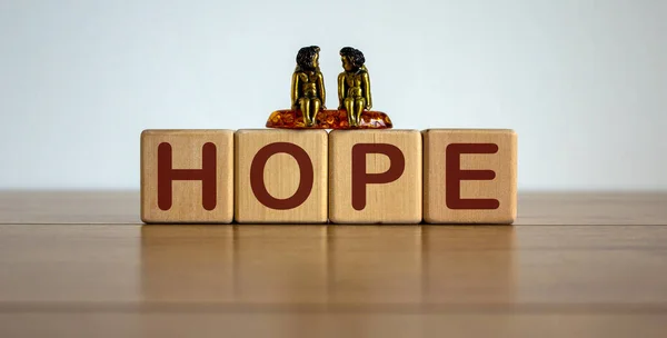 Concept Word Hope Made Wooden Cubes Two Metalic Angeles — Stock Photo, Image