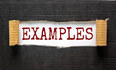 Yırtık siyah kağıdın arkasında görünen 