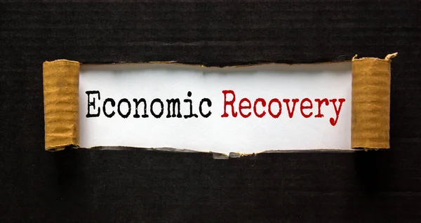 Words Economic Recovery Appearing Torn Black Paper Beautiful Background Business — Stock Photo, Image