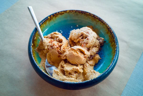 Balls Brown Ice Cream Grains Salt Blue Plate Metal Spoon — Stock Photo, Image