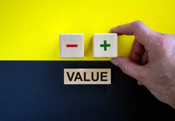 Businessman Holds Cubes Icon Wooden Cubes Word Value Beautiful Yellow — Stock Photo, Image