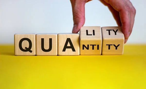 Quality Quantity Hand Turns Cubes Changes Word Quantity Quality Beautiful — Stock Photo, Image