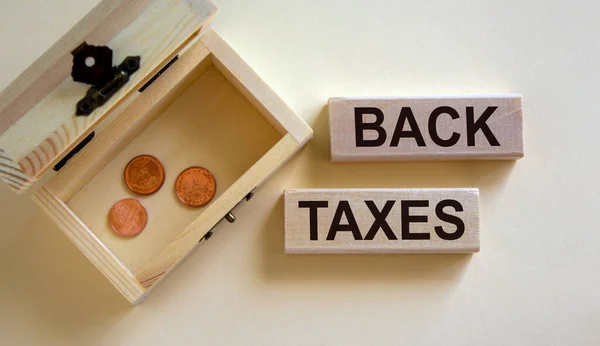 Concept Words Back Taxes Blocks Beautiful White Background Small Chest — Stock Photo, Image