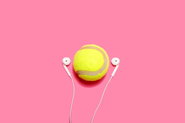 Tennis Ball Earphones Pastel Pink Background Sports Enjoy Music Minimal — Stock Photo, Image