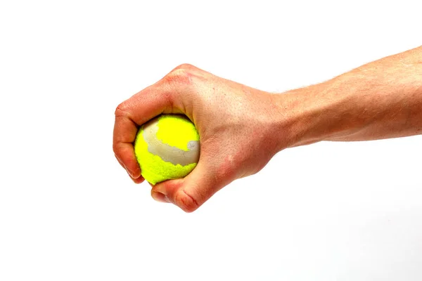 Mannelijke Hand Houden Tennisbal Geïsoleerd Witte Achtergrond Minimalistisch Concept — Stockfoto