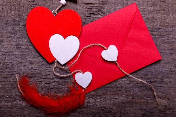 Valentines Day Envelope Mail, Red Heart. Valentine Letter Card, Wedding Love Concept in colorful letters envelopes. Gold seal with hearts valentine envelopes. Vintage white wood background.